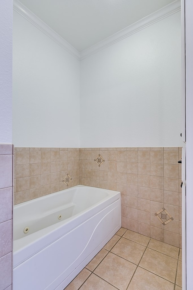 full bathroom featuring crown molding, tile patterned flooring, and a tub with jets