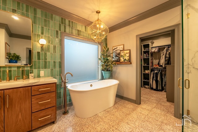 bathroom featuring crown molding, vanity, separate shower and tub, and tile walls