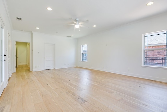 spare room featuring recessed lighting, visible vents, a ceiling fan, ornamental molding, and light wood-type flooring