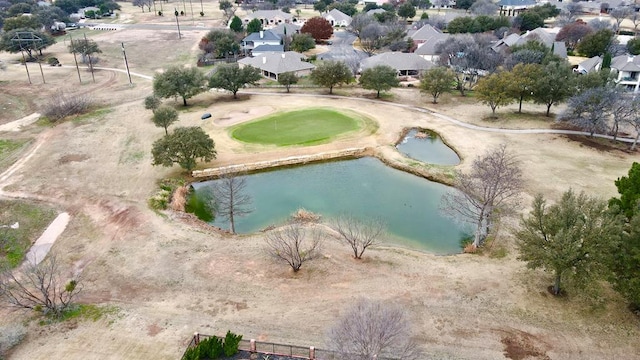 bird's eye view featuring a residential view, golf course view, and a water view