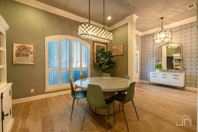 dining area with crown molding and light wood-type flooring