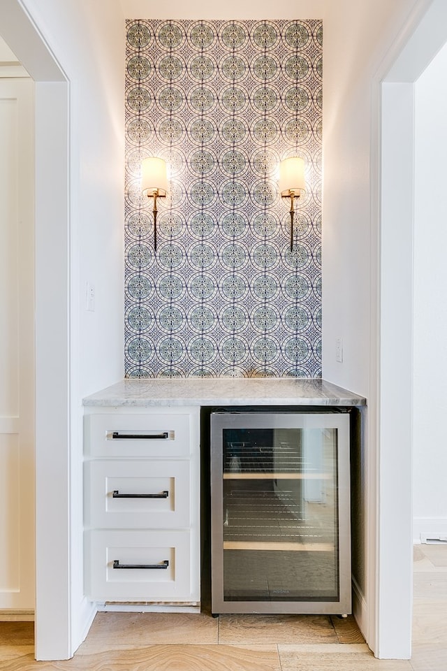 bar featuring beverage cooler