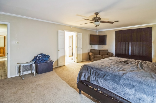 bedroom featuring ornamental molding, light carpet, and ceiling fan