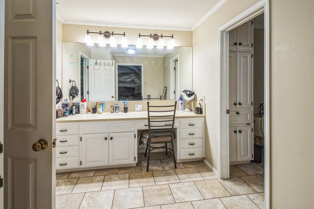 bathroom featuring vanity and crown molding