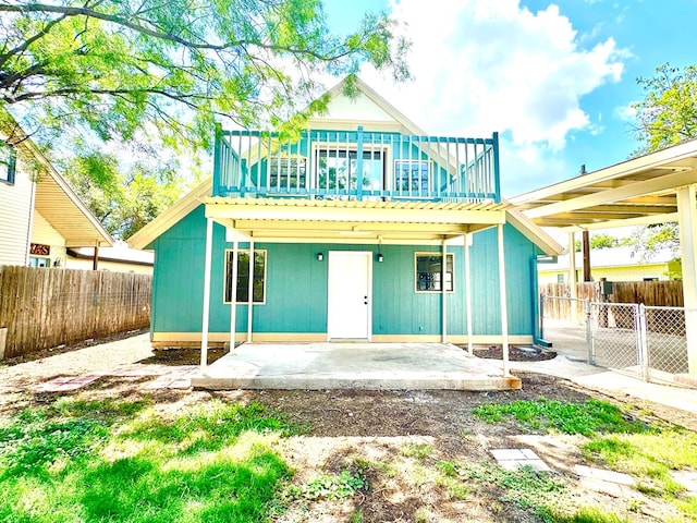 back of house featuring a patio area