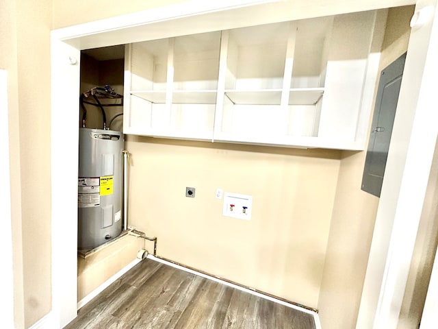 utility room featuring water heater