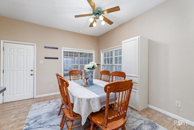 901 Koberlin St, San Angelo, TX 76903 - dining room with light wood-style flooring, a ceiling fan, and baseboards
