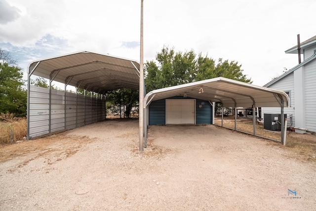 view of vehicle parking with a carport