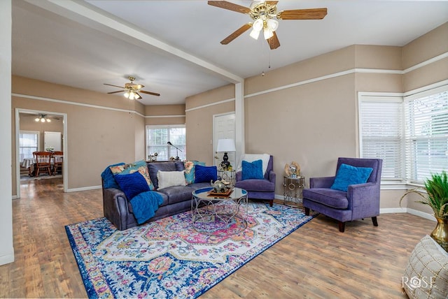 901 Koberlin St, San Angelo, TX 76903 - living area with ceiling fan, wood finished floors, and baseboards