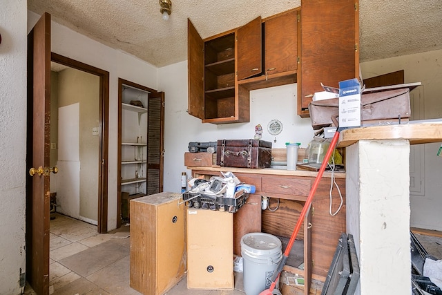 kitchen with a textured ceiling