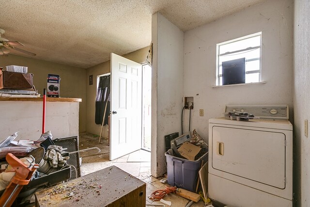 interior space with washer / clothes dryer, a textured ceiling, and ceiling fan