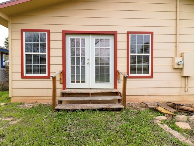 entrance to property featuring french doors