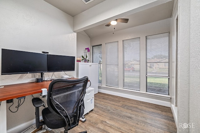 3610 Southland Blvd, San Angelo, TX 76904 - office area featuring a ceiling fan, a textured wall, wood finished floors, baseboards, and vaulted ceiling