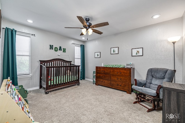 3610 Southland Blvd, San Angelo, TX 76904 - bedroom featuring carpet, a nursery area, recessed lighting, baseboards, and a ceiling fan
