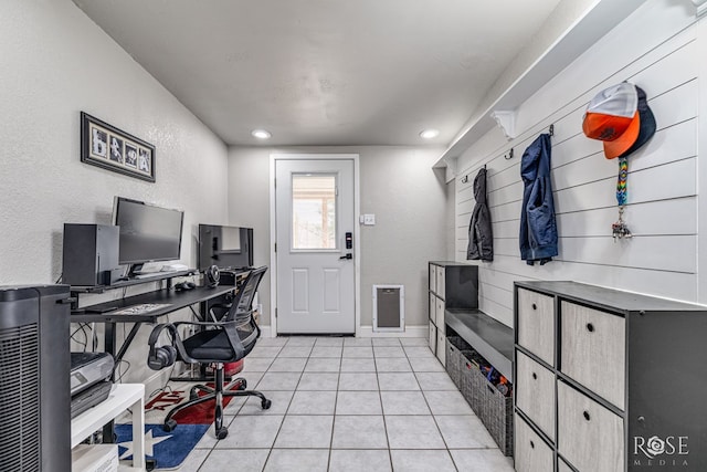 3610 Southland Blvd, San Angelo, TX 76904 - home office with light tile patterned floors, a textured wall, recessed lighting, and baseboards