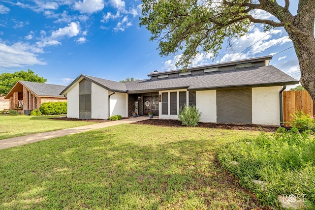3610 Southland Blvd, San Angelo, TX 76904 - mid-century inspired home featuring stucco siding and a shingled roof