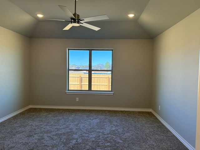 unfurnished room featuring lofted ceiling, recessed lighting, a ceiling fan, baseboards, and dark carpet