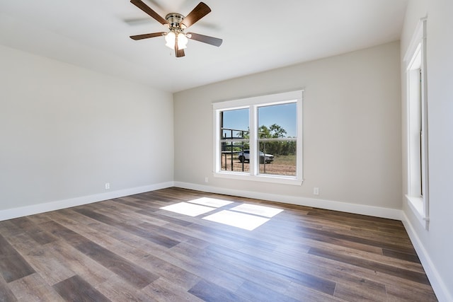 5001 Fm 2333, Bronte, TX 76933 - empty room with dark wood-type flooring, ceiling fan, and baseboards
