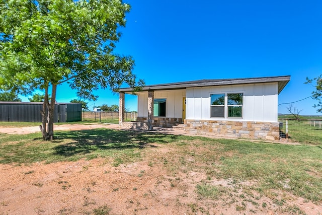 5001 Fm 2333, Bronte, TX 76933 - back of house featuring stone siding and board and batten siding