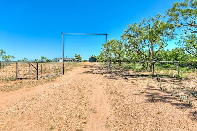 5001 Fm 2333, Bronte, TX 76933 - view of dirt / gravel road featuring a view of countryside and a gated entry