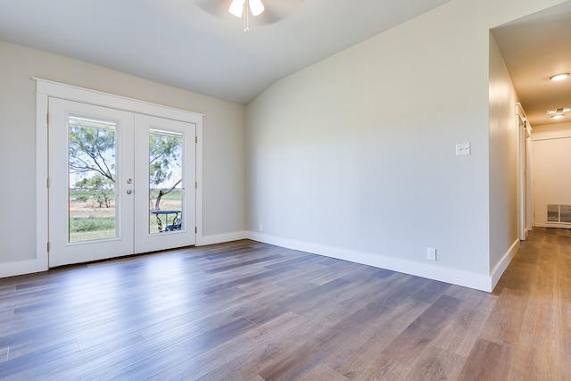 5001 Fm 2333, Bronte, TX 76933 - spare room with french doors, wood finished floors, ceiling fan, baseboards, and vaulted ceiling