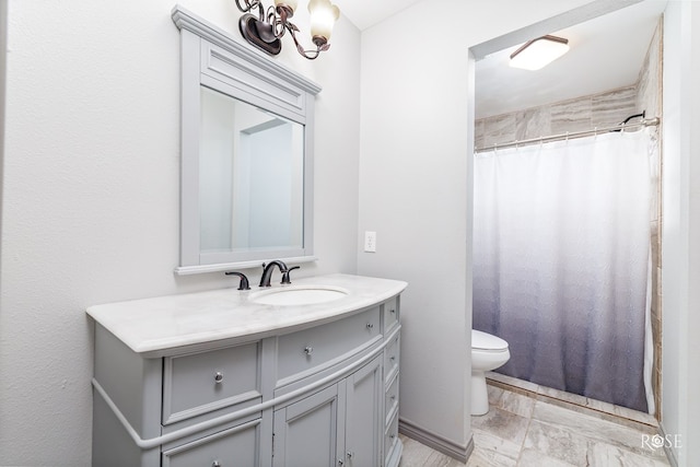 bathroom with vanity, toilet, and a shower with shower curtain