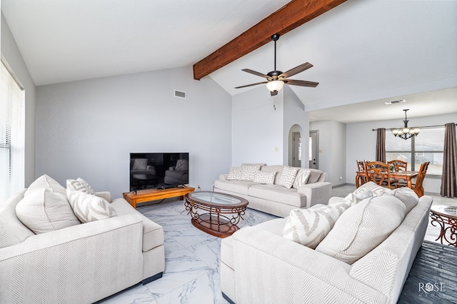 living room with ceiling fan with notable chandelier and lofted ceiling with beams