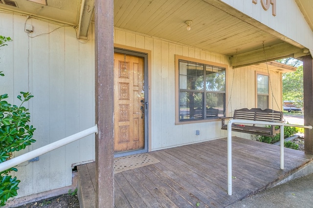 entrance to property featuring a deck