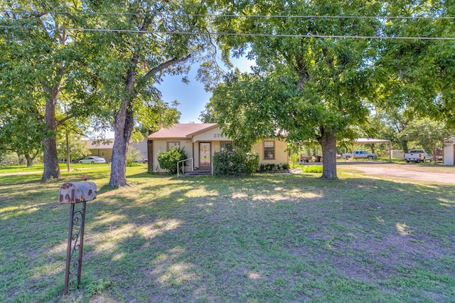 view of front of property with a front yard