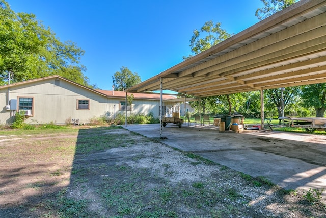 view of yard with a carport