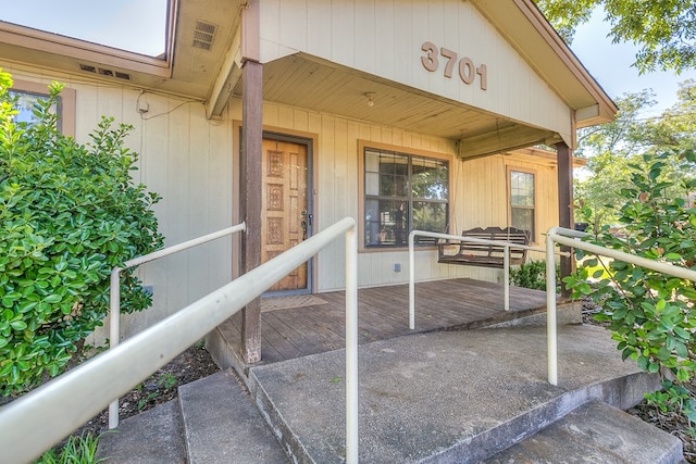 property entrance with a porch