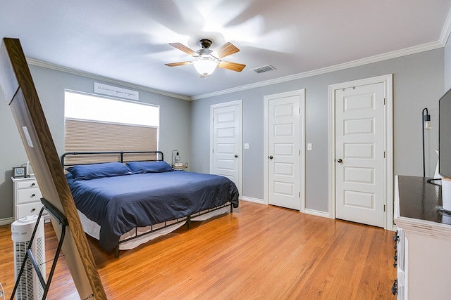 bedroom with crown molding, ceiling fan, and light wood-type flooring