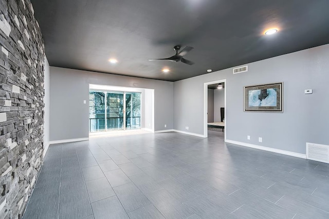 220-K W Twohig Ave, San Angelo, TX 76901 - unfurnished room with ceiling fan and baseboards