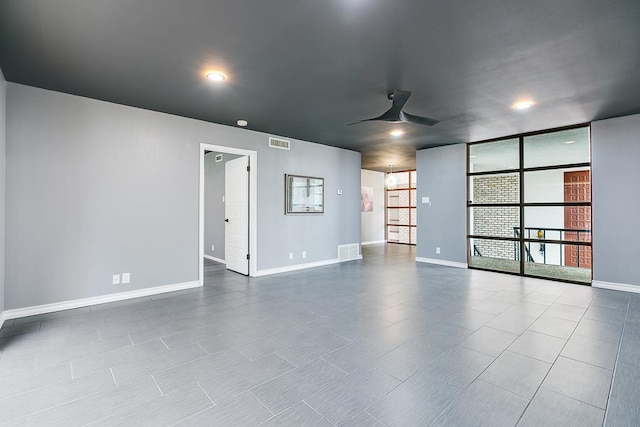 220-K W Twohig Ave, San Angelo, TX 76901 - unfurnished room with ceiling fan and baseboards