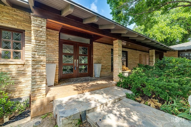 1703 Christoval Rd, San Angelo, TX 76903 - property entrance with covered porch and stone siding