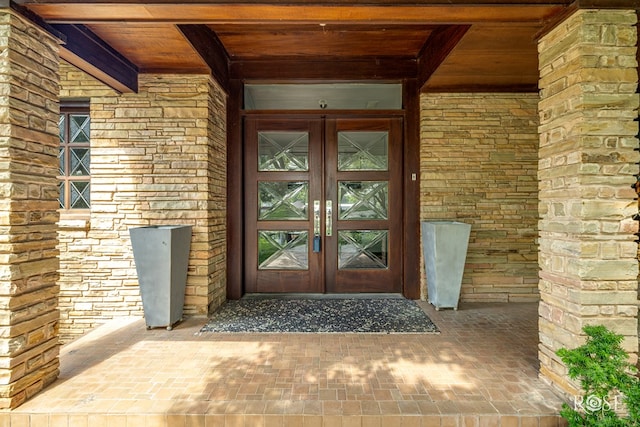 1703 Christoval Rd, San Angelo, TX 76903 - doorway to property with french doors and stone siding