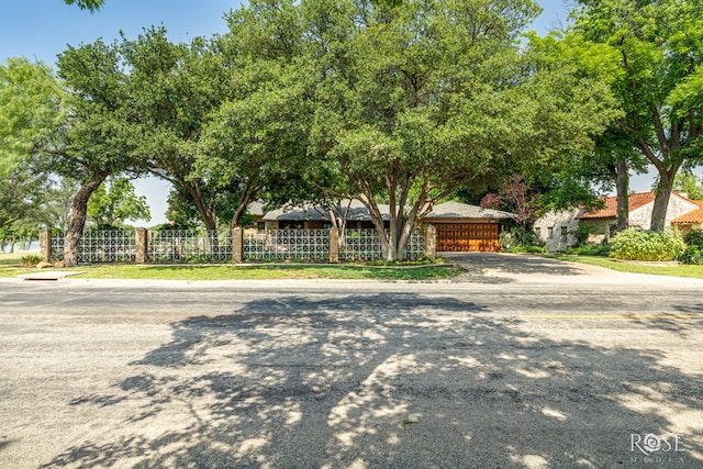 1703 Christoval Rd, San Angelo, TX 76903 - view of front of house with a garage