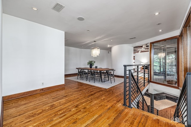 1703 Christoval Rd, San Angelo, TX 76903 - dining room with wood finished floors, baseboards, and recessed lighting