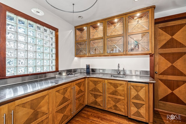 1703 Christoval Rd, San Angelo, TX 76903 - indoor wet bar featuring dark wood-type flooring and wine cooler