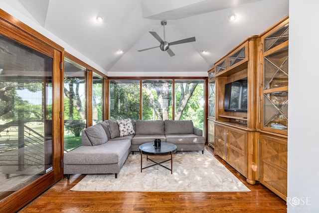 1703 Christoval Rd, San Angelo, TX 76903 - living room with lofted ceiling, wood finished floors, and a ceiling fan