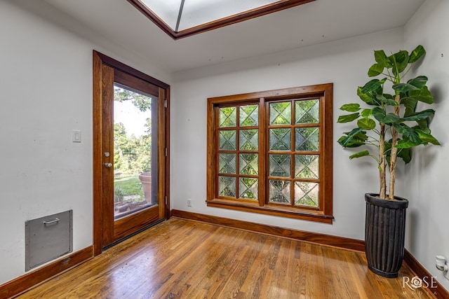 1703 Christoval Rd, San Angelo, TX 76903 - empty room with baseboards and wood finished floors
