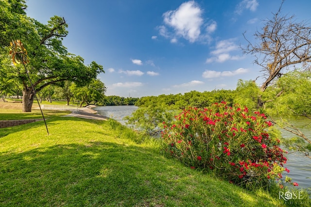 1703 Christoval Rd, San Angelo, TX 76903 - view of green lawn featuring a water view