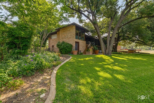 1703 Christoval Rd, San Angelo, TX 76903 - view of green lawn