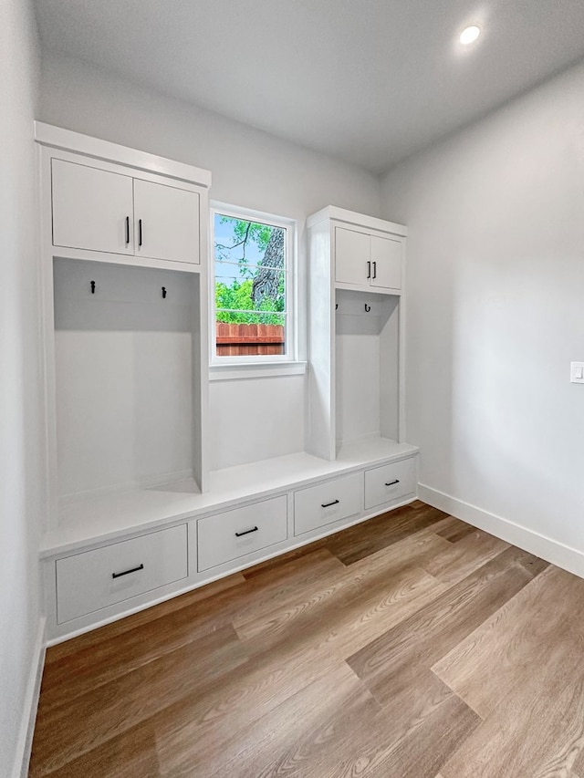 1603 Paseo De Vaca St, San Angelo, TX 76901 - mudroom with light wood-style floors and recessed lighting