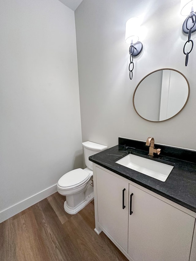 1603 Paseo De Vaca St, San Angelo, TX 76901 - bathroom with wood finished floors and vanity