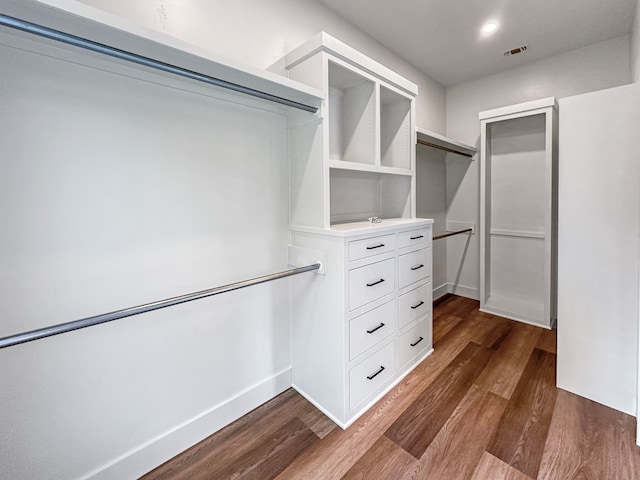 1603 Paseo De Vaca St, San Angelo, TX 76901 - walk in closet with dark wood-type flooring