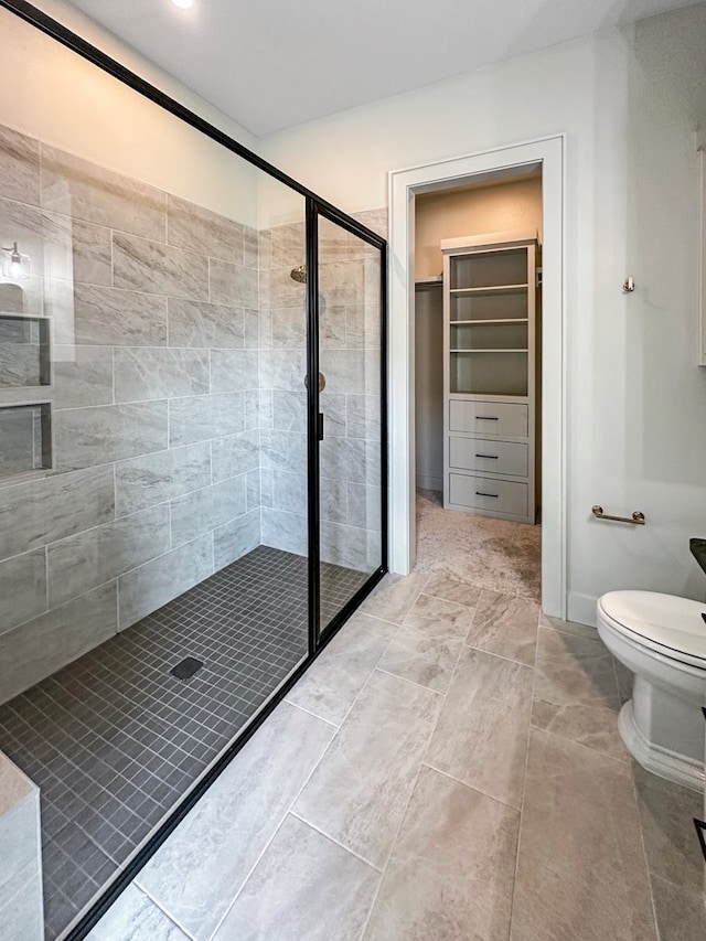 1603 Paseo De Vaca St, San Angelo, TX 76901 - bathroom with a shower stall and a walk in closet