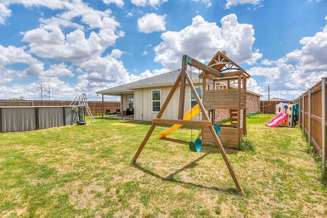 1501 Montague Ave, San Angelo, TX 76905 - view of jungle gym with a fenced backyard