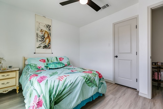 1501 Montague Ave, San Angelo, TX 76905 - bedroom with light wood finished floors and a ceiling fan