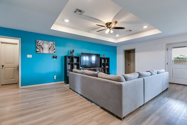 1501 Montague Ave, San Angelo, TX 76905 - living area with a raised ceiling, light wood-style floors, recessed lighting, and a ceiling fan